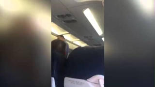 Passengers Boo Flight Crew as Crying Woman Is Kicked Off Airplane